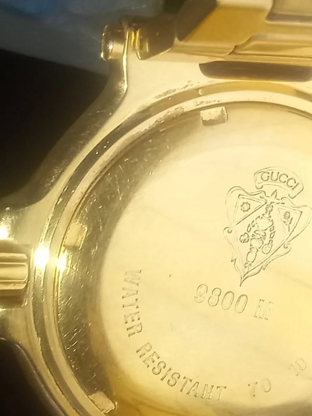 Authentic Gucci 9800M Golden Stainless Steel Bracelet Watch.